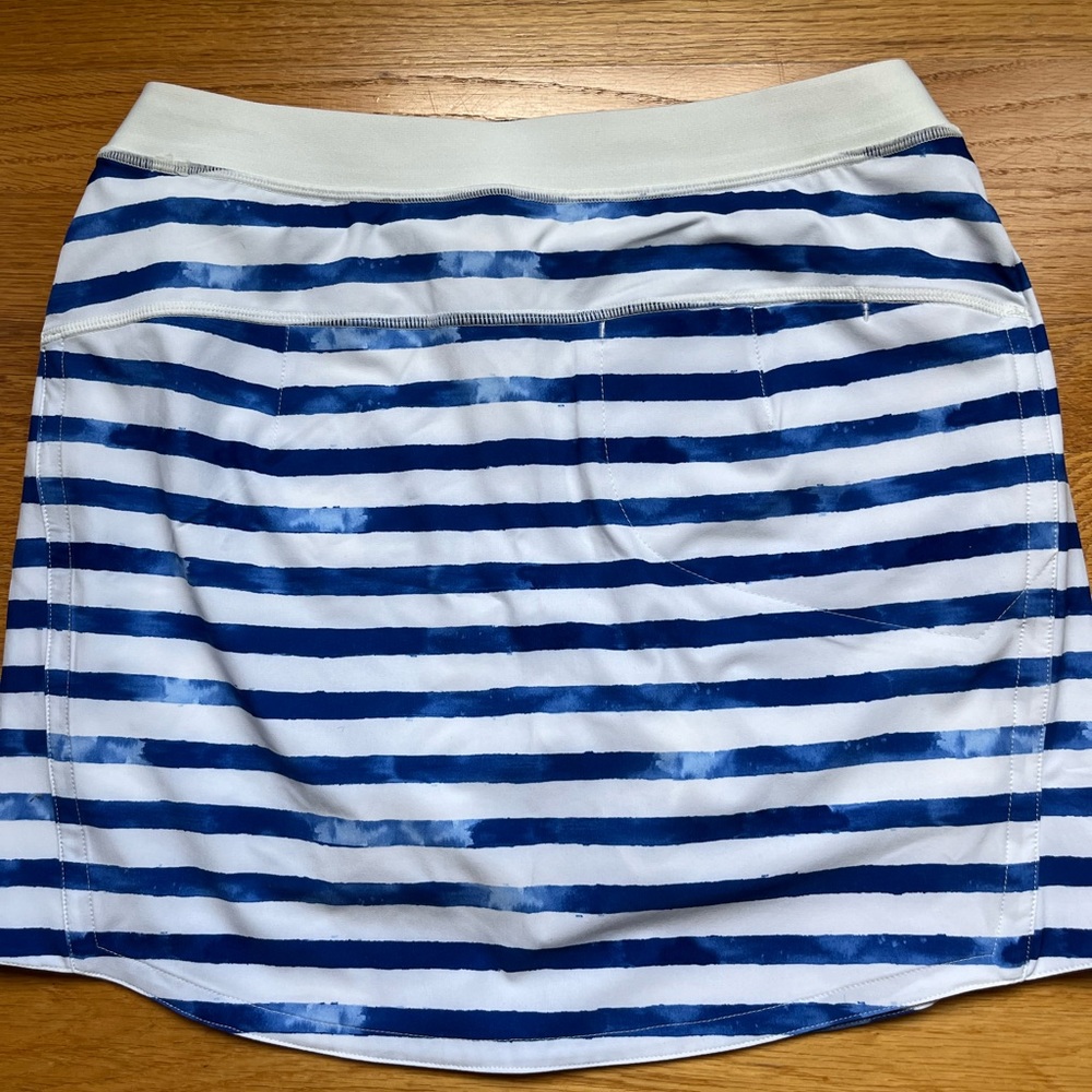 RLX - Ralph Lauren  XS watercolor blue/white stripe golf skort - NWT.